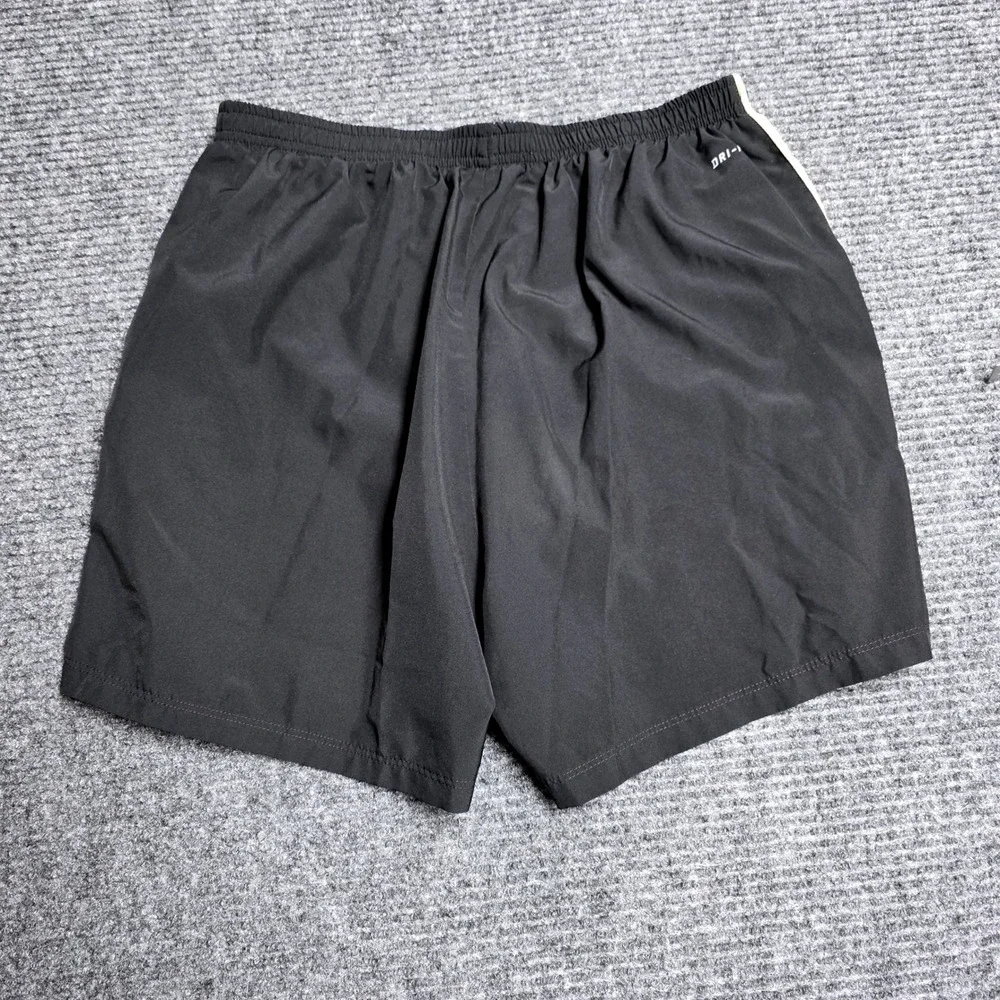 Nike Dri-FIT Running Shorts Women's ‎ Size L Black Neon Yellow Stripe